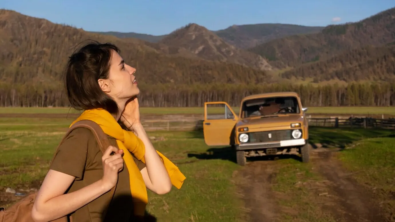 A medium shot of a woman outside.